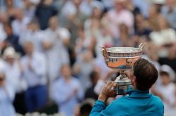 爱游戏在线-法国网球队险胜英国网球队，纳达尔惊艳世界的简单介绍